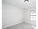 Neutral bedroom features plush carpeting and a well-lit window area at 56 Windom Dr, Carrollton, GA 30116
