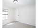 This bedroom has neutral carpet, a clean design, and lots of natural light at 56 Windom Dr, Carrollton, GA 30116