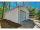 Detached two-car garage and concrete driveway at 56 Windom Dr, Carrollton, GA 30116