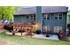 Expansive backyard featuring a pergola-covered patio, seating, and lush lawn at 602 Redbud Ter, Canton, GA 30115