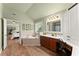 Bathroom featuring a soaking tub, vanity, and dual sinks at 602 Redbud Ter, Canton, GA 30115