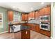 This kitchen features granite countertops, stainless appliances, tile backsplash, and island with seating at 602 Redbud Ter, Canton, GA 30115