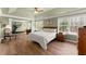 Spacious main bedroom with tray ceiling, natural light, and flexible layout at 602 Redbud Ter, Canton, GA 30115