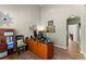 Bright office with laminate floors, modern desk, and tall ceilings at 602 Redbud Ter, Canton, GA 30115