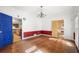 Spacious dining room with hardwood floors, white walls with contrasting trim and doors leading to other rooms at 6048 Kings Mountain Way, Tucker, GA 30087