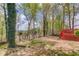 A spacious backyard with a deck area provides an ideal setting for outdoor enjoyment at 725 Martin Field Dr, Lawrenceville, GA 30045