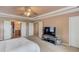 Primary bedroom with door leading to bathroom at 725 Martin Field Dr, Lawrenceville, GA 30045