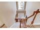 Spacious foyer with chandelier, hardwood floors, and staircase at 725 Martin Field Dr, Lawrenceville, GA 30045