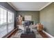 Office with hardwood floors, large windows, and a neutral paint color, perfect for working at home at 725 Martin Field Dr, Lawrenceville, GA 30045