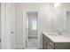Well-lit bathroom with modern vanity, undermount sink, and stylish hardware at 1010 Coleman Place Dr, Roswell, GA 30075