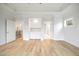 This bedroom features hardwood floors, recessed lighting, and neutral paint at 1010 Coleman Place Dr, Roswell, GA 30075