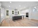 Modern kitchen with a dark island, stainless steel appliances, and plenty of counter space at 1010 Coleman Place Dr, Roswell, GA 30075