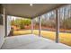 Covered patio with room for entertaining and an outdoor seating area at 1010 Coleman Place Dr, Roswell, GA 30075