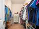 Spacious walk-in closet with custom shelving and storage solutions at 204 Phillips Ln, Alpharetta, GA 30009