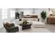 Beautiful living room featuring stylish furniture and an adjacent kitchen at 204 Phillips Ln, Alpharetta, GA 30009