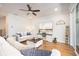 Inviting living room boasts hardwood floors, neutral walls, and ample natural light at 204 Phillips Ln, Alpharetta, GA 30009