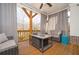 Relaxing outdoor covered patio with comfortable seating and serene views at 204 Phillips Ln, Alpharetta, GA 30009
