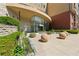 Beautiful building entrance with manicured landscaping, flowers, and modern design elements at 400 17Th Nw St # 2029, Atlanta, GA 30363
