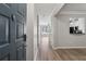 Inviting entryway with hardwood floors leading into the kitchen and living room area at 400 17Th Nw St # 2029, Atlanta, GA 30363
