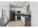 Modern kitchen featuring stainless steel appliances and sleek countertops at 400 17Th Nw St # 2029, Atlanta, GA 30363