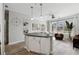 Open concept living area, seamlessly connects to the kitchen with modern island and decor at 400 17Th Nw St # 2029, Atlanta, GA 30363