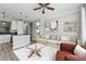 Bright, open living room with modern decor and connecting to the kitchen at 400 17Th Nw St # 2029, Atlanta, GA 30363