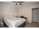 This is a bedroom with a bed, a desk, an office chair, and an entrance to another room at 540 Broughton Dr, Canton, GA 30114
