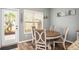 The dining area features a round table and a door leading to the outside at 540 Broughton Dr, Canton, GA 30114