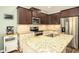 The kitchen features granite countertops, stainless appliances, and brown cabinets at 540 Broughton Dr, Canton, GA 30114