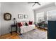Bedroom with hardwood floors, natural light and a comfortable daybed and work space at 201 W Ponce De Leon Ave # 303, Decatur, GA 30030