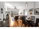 Cozy living room with hardwood floors and a patio walkout offerring natural light at 201 W Ponce De Leon Ave # 303, Decatur, GA 30030