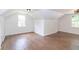 Spacious bedroom featuring hardwood floors, white walls and natural light at 2010 Bixby Se St, Atlanta, GA 30317