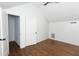 Bright bedroom with hardwood floors and closet featuring a vaulted ceiling at 2010 Bixby Se St, Atlanta, GA 30317
