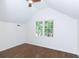 Bedroom featuring hardwood floors, neutral walls and a window with nature view at 2010 Bixby Se St, Atlanta, GA 30317