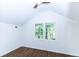 Bedroom featuring a vaulted ceiling, hardwood floors, and a window providing natural light at 2010 Bixby Se St, Atlanta, GA 30317