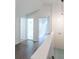 Bright hallway with hardwood flooring and access to multiple rooms at 2010 Bixby Se St, Atlanta, GA 30317