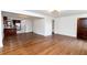 Spacious living room featuring hardwood floors that flow into the updated kitchen area with modern appliances at 2010 Bixby Se St, Atlanta, GA 30317