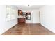 Bright living room with hardwood floors, and clear view into the well lit modern kitchen at 2010 Bixby Se St, Atlanta, GA 30317