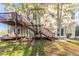Multi-tiered deck offers outdoor living overlooking the backyard at 288 Pine Way, Dallas, GA 30157