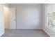 Bedroom featuring plush carpeting, natural light, and neutral walls at 288 Pine Way, Dallas, GA 30157