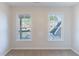 Cozy bedroom with carpeting, large windows, and ample natural light at 288 Pine Way, Dallas, GA 30157