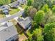 Overhead view captures a charming home nestled in a neighborhood with green spaces and a sense of community at 3835 New Salem Ct, Cumming, GA 30040