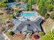 Aerial view of the community clubhouse, pool, tennis courts, and playground at 3835 New Salem Ct, Cumming, GA 30040