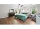 Bright bedroom with hardwood floors and large windows at 3835 New Salem Ct, Cumming, GA 30040