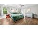 Well-lit bedroom with hardwood floors and ample natural light at 3835 New Salem Ct, Cumming, GA 30040