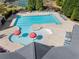 Aerial view of the community pool with chairs, tables, and splash features at 3835 New Salem Ct, Cumming, GA 30040