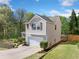 Exterior view of a home with well manicured lawn and professional landscaping at 3835 New Salem Ct, Cumming, GA 30040