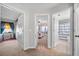 Hallway with doorways into bedrooms and bathroom at 3835 New Salem Ct, Cumming, GA 30040