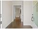 Inviting foyer featuring hardwood floors and a view of the staircase at 685 Summitt Hill Way, Cumming, GA 30040