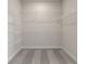 Walk-in closet featuring wire shelving for optimal organization and storage space at 685 Summitt Hill Way, Cumming, GA 30040